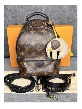 Louis Vuitton palm springs mini monogram backpack with rare elephant charm